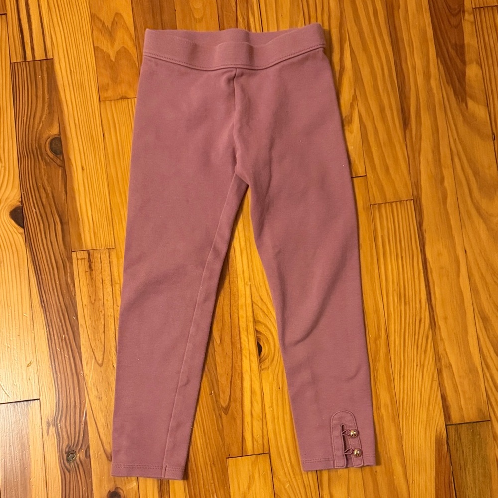 Janie and Jack mauve pants with gold button embellishments on the ankle